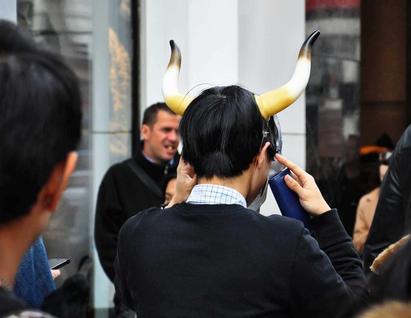 A guy wearing horns.